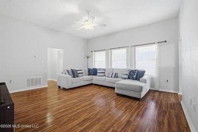 This beautiful brick home is located in a quiet subdivision with - photo 3