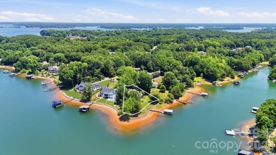 Extraordinary lakefront properties begin with extraordinary - photo 1