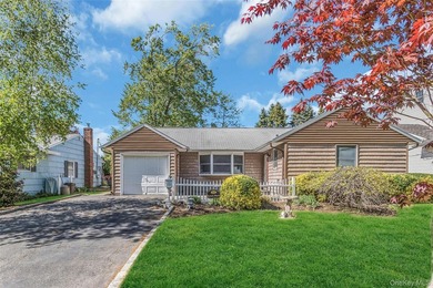Tucked away in the desirable community of Glen Cove, this - photo 1