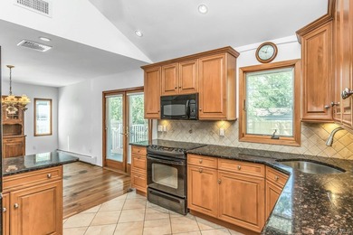 Tucked away in the desirable community of Glen Cove, this - photo 9