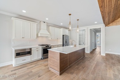 NEW CONSTRUCTION - MAIN LEVEL LIVING WITH BONUS UP! Located in - photo 16