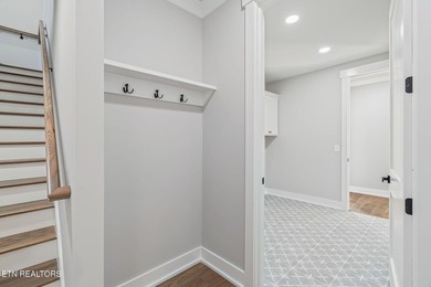 NEW CONSTRUCTION - MAIN LEVEL LIVING WITH BONUS UP! Located in - photo 18