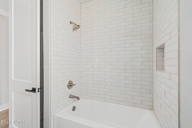 NEW CONSTRUCTION - MAIN LEVEL LIVING WITH BONUS UP! Located in - photo 32