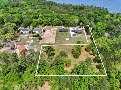 Set on 2.36 private acres, 98 Alston Road presents a rare - photo 1