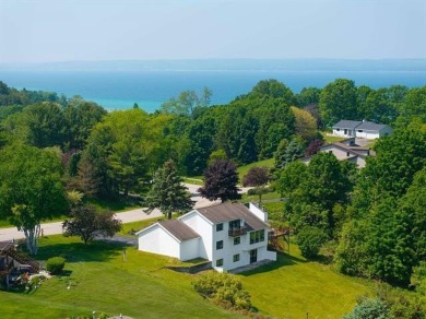 Lake Home For Sale in Peninsula Twp, Michigan