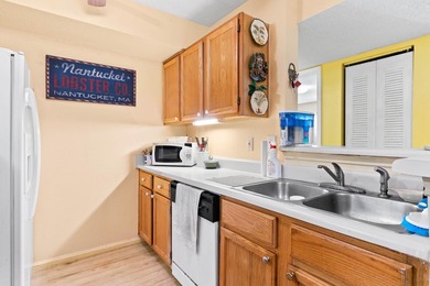 This ground floor 2-bedroom 2-bathroom unit is in one of the - photo 9