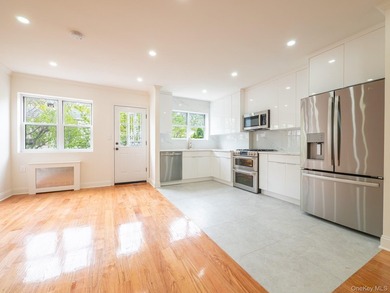 A fully renovated corner brick home at 2134 Hendrickson, where - photo 7
