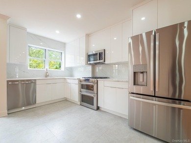 A fully renovated corner brick home at 2134 Hendrickson, where - photo 8