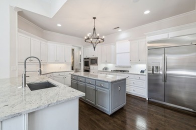 Welcome to this stunning two-story brick home nestled in the - photo 12