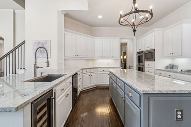 Welcome to this stunning two-story brick home nestled in the - photo 13