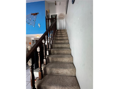 Welcome to Coastal living! This charming townhome is located on - photo 13
