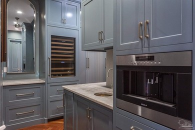 This exquisite 5-bedroom, 4 and half-bathroom residence offers - photo 11