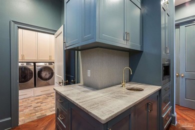 This exquisite 5-bedroom, 4 and half-bathroom residence offers - photo 12