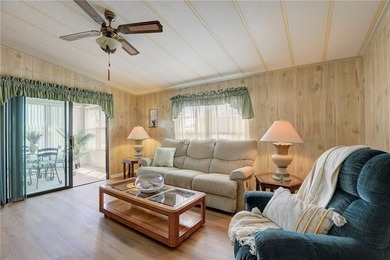 Just a short walk to the golf course, this well-maintained home - photo 4