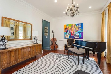 This exquisite 5-bedroom, 4 and half-bathroom residence offers - photo 18