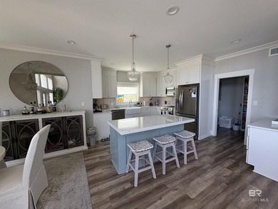 This custom waterfront home is located in the most convenient - photo 8