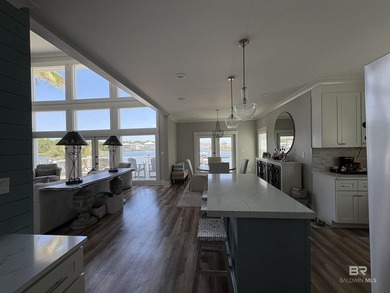 This custom waterfront home is located in the most convenient - photo 9