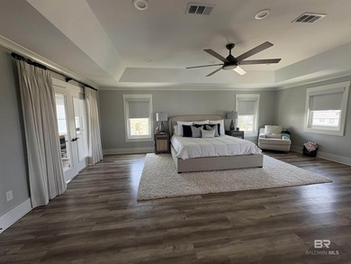 This custom waterfront home is located in the most convenient - photo 10