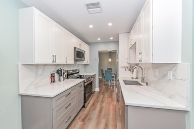 Experience modern luxury and a resort-style lifestyle in this - photo 13