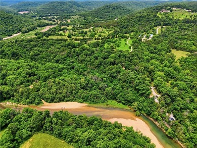 Nestled on 10.086 secluded acres along the Kings River, this - photo 16
