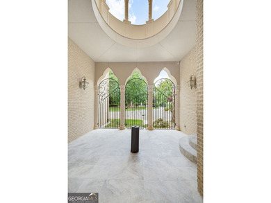 Welcome to one of Atlanta's most extraordinary estates, where - photo 40
