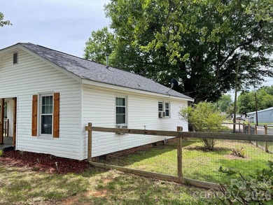 Charming, corner lot home with back deck and fenced back yard - photo 4