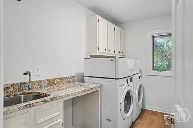 Beautifully reimagined and move-in ready, this updated 3-bedroom - photo 14