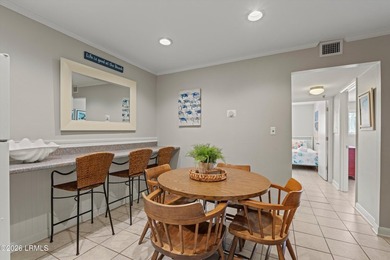 Welcome to your turnkey coastal escape! This beautifully updated - photo 2