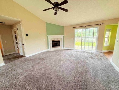 Welcome to this beautifully maintained 4-bedroom, 2-bath brick - photo 2