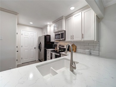 This beautifully updated and remodeled home on the Island is