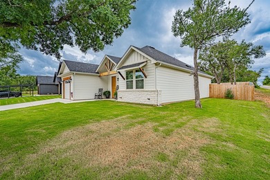 This stunning modern farmhouse sits on a corner lot and is - photo 2