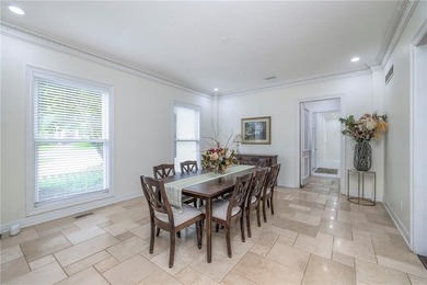 Located on an exceptional +/-0.6 acre golf course lot in - photo 8
