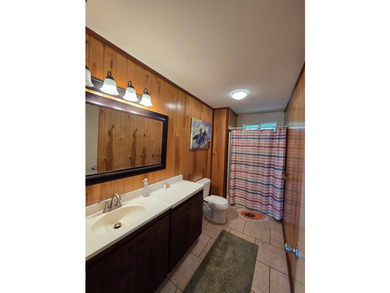 Welcome home to this warm and welcoming 3-bedroom, 2.5-bathroom - photo 9