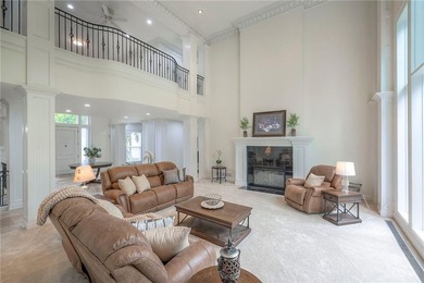 Located on an exceptional +/-0.6 acre golf course lot in - photo 10