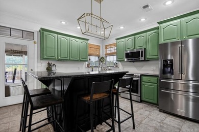Welcome home to this beautifully designed 4-bedroom, 2.5-bath - photo 11