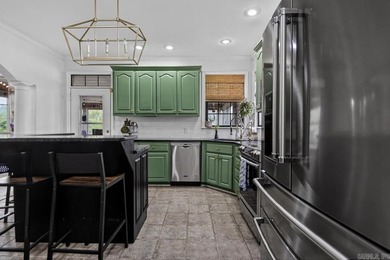 Welcome home to this beautifully designed 4-bedroom, 2.5-bath - photo 12