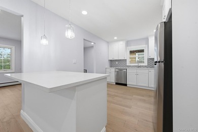 Beutifully Renovated 2 Family High Ranch, 6 Bedrooms, 4 Full - photo 15