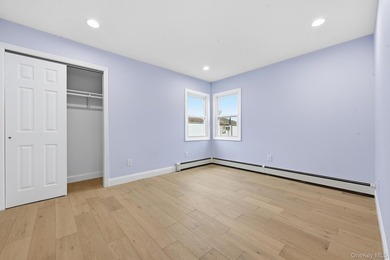 Beutifully Renovated 2 Family High Ranch, 6 Bedrooms, 4 Full - photo 19