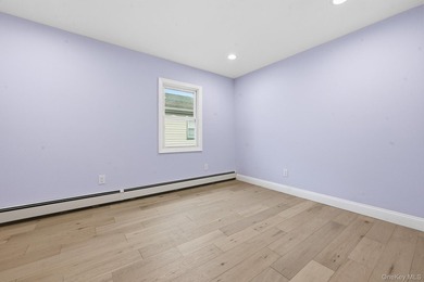 Beutifully Renovated 2 Family High Ranch, 6 Bedrooms, 4 Full - photo 21