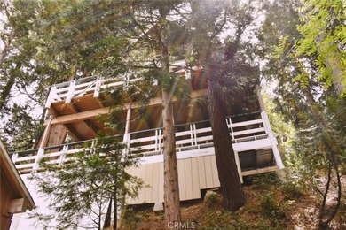 Tucked away in the scenic mountains of Crestline, this charming - photo 2