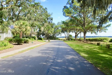 Tucked beneath a canopy of moss-draped live oaks, this home in - photo 6