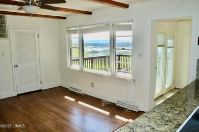 Tucked beneath a canopy of moss-draped live oaks, this home in - photo 9