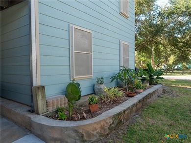 Welcome to this exceptional 2,488 sq ft two-story coastal home