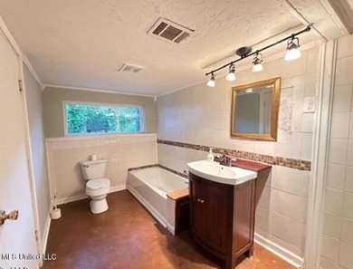 Charming Beach Cottage is full of charm and character. Situated - photo 13