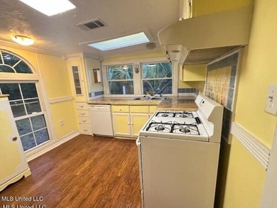 Charming Beach Cottage is full of charm and character. Situated - photo 15