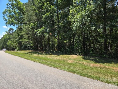 This Badin Lake area lot is located in the prestigious gated - photo 8