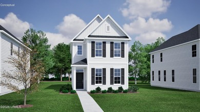 The Delaney plan features a formal dining room with a coffered - photo 1