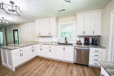 Completely gutted and beautifully remodeled, this waterfront - photo 23