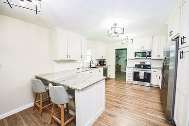 Completely gutted and beautifully remodeled, this waterfront - photo 25