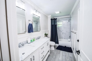 Completely gutted and beautifully remodeled, this waterfront - photo 29